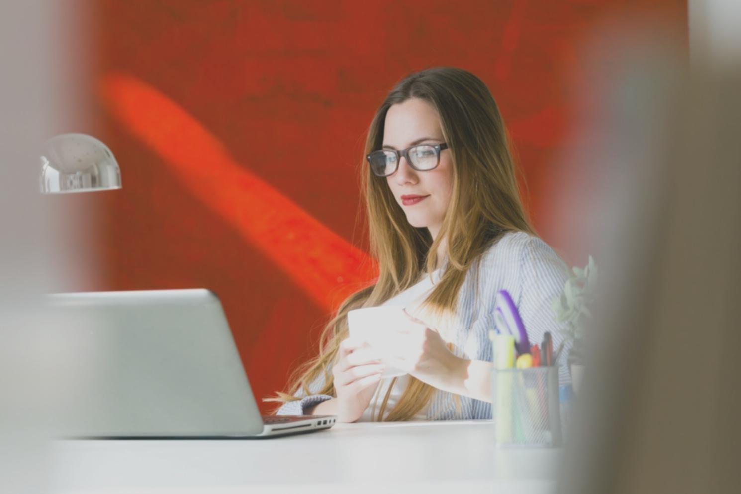 Person working with financial planning tools and documents